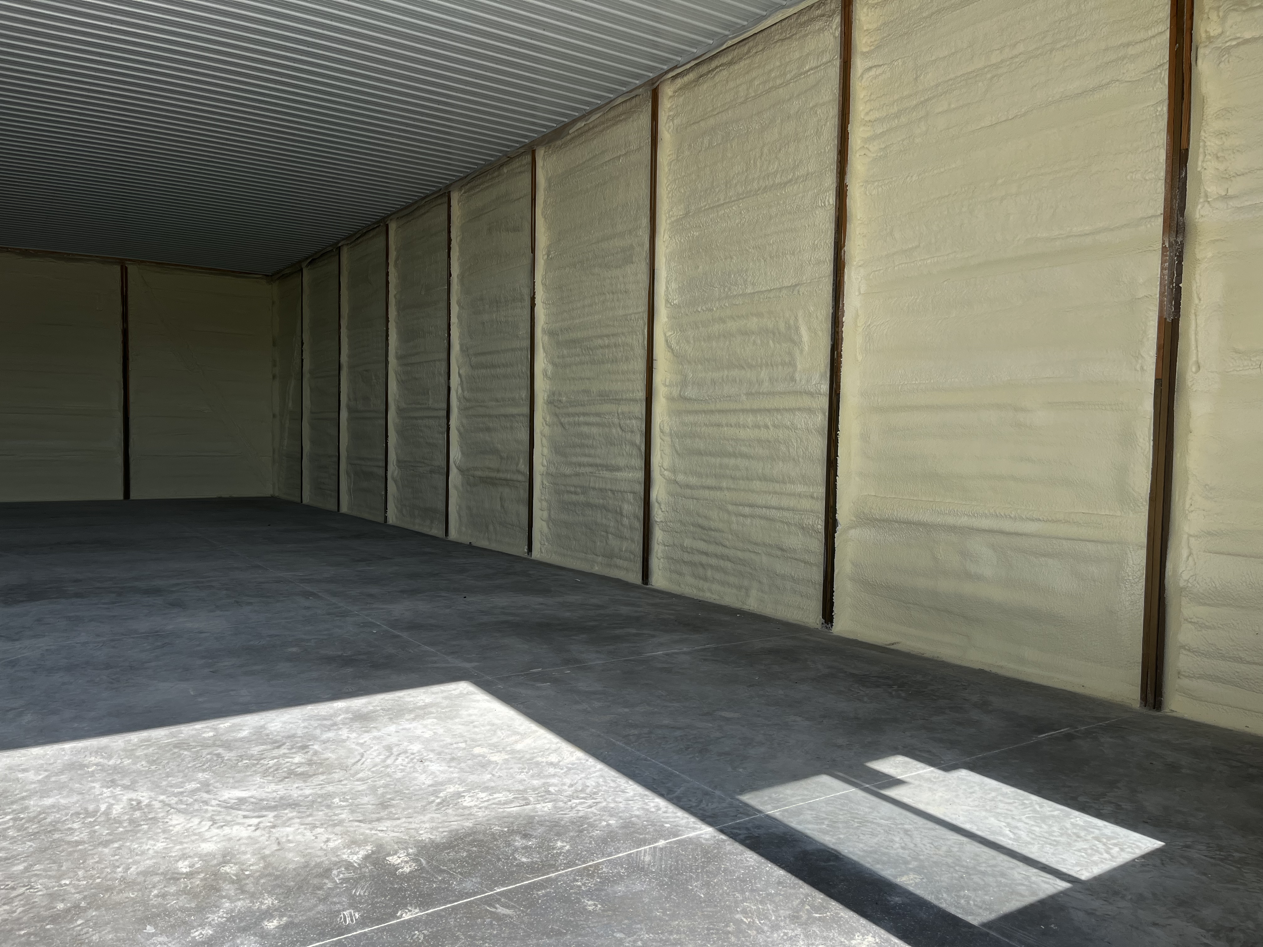 Spray Foam vs. Fiberglass on a metal building in Iowa